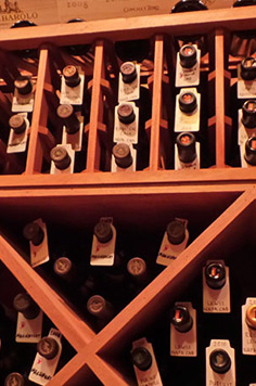 wine bottles, aging wine bottle, vintage wine bottle, import wine, wine cellar, custom wine cellar, aabc wine cellar, triangle cubby, custom wood work, carpentry