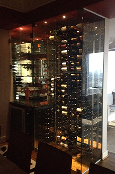 kitchen wine cellar, custom wine cellar, houston wine cellar, aabc wine cellar, red wines, vintage red wine, small cellar, luxurious wine cellar, glass door, granite top