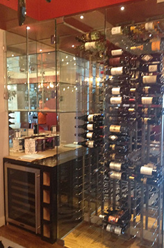 kitchen wine cellar, custom wine cellar, houston wine cellar,  wine cellar, red wines, vintage red wine, small cellar, luxurious wine cellar, glass door, granite top
