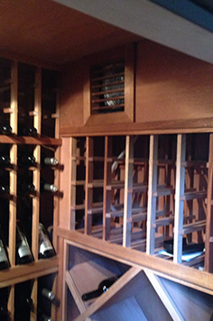 wine cellar under a stair case
